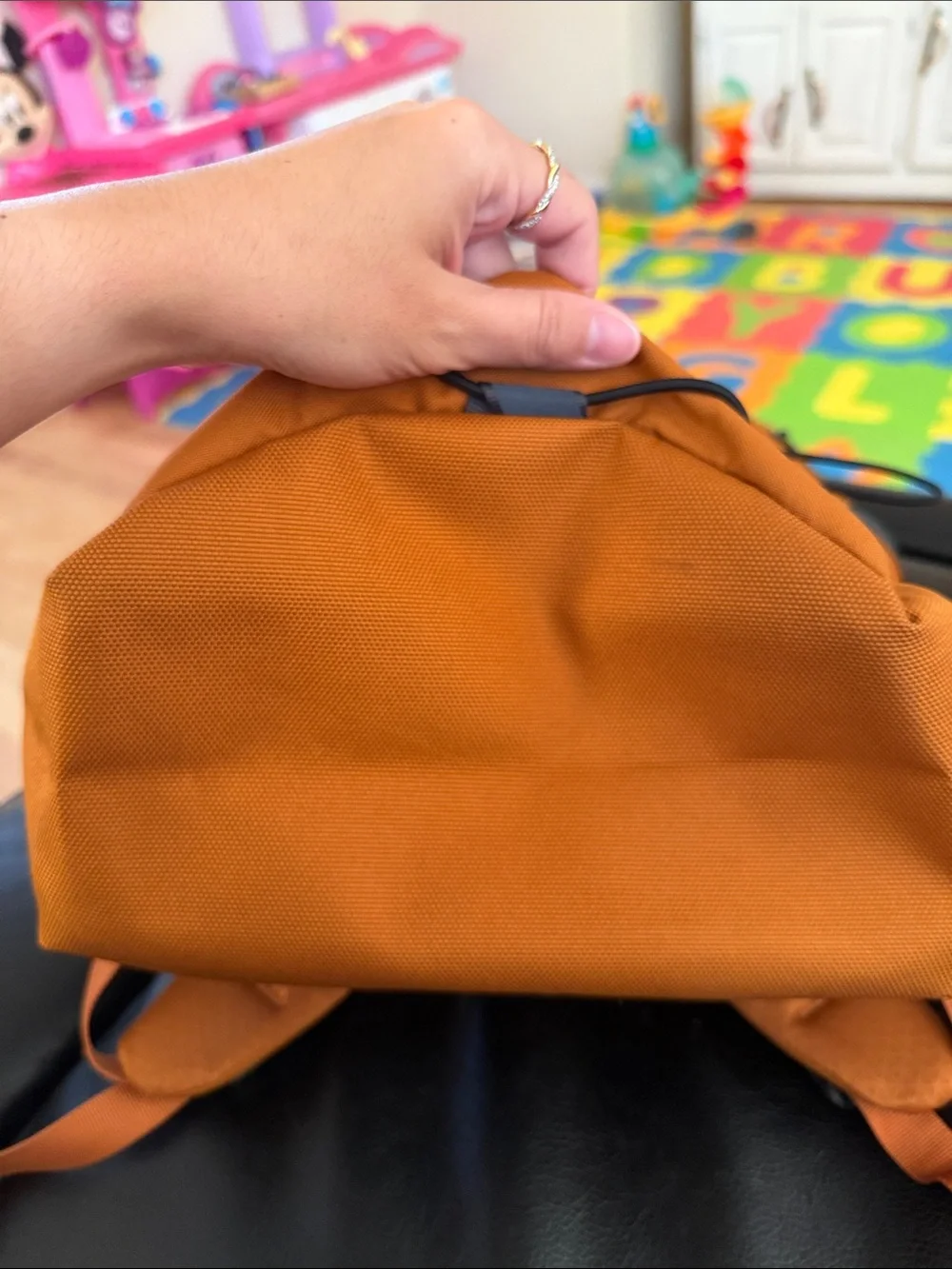The North Face Jester Backpack in burnt orange with black accents